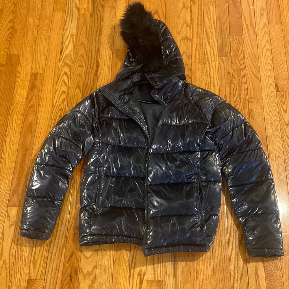 Large size Beautiful jacket. Very good jacket for winter cold or snow.